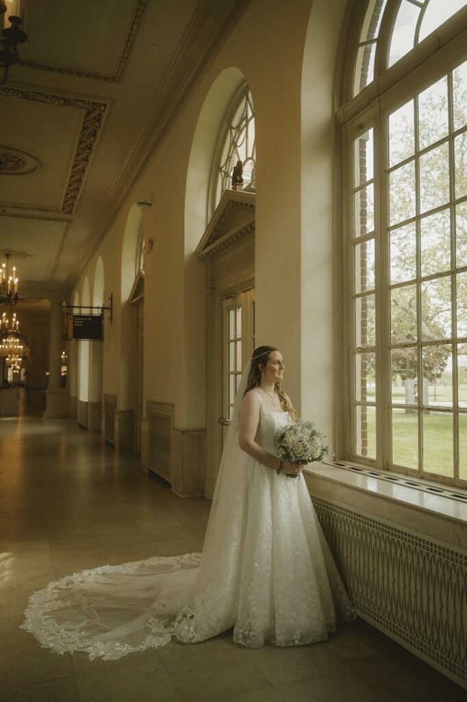 Bride with curly half-up half down long dirty blonde hair.